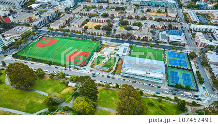 Aerial apartment buildings with multiple sport fields and courts in San Francisco 107452491