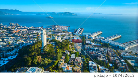 Aerial overlooking Coit Tower with view of San Francisco Bay and Alcatraz Island 107452615