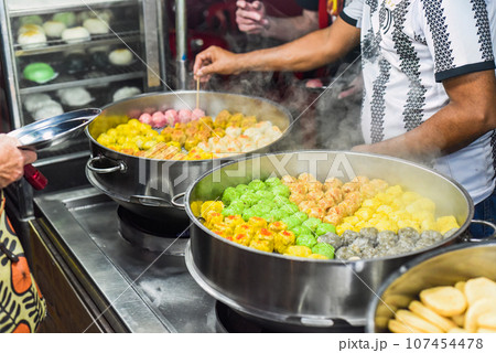 Handmade Dim Sum with different fillings in Jalan Alor street food in Kuala Lumpur Handmade Dim Sum with different fillings in Jalan Alor street food in Kuala Lumpur 107454478