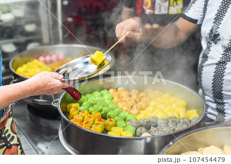 Handmade Dim Sum with different fillings in Jalan Alor street food in Kuala Lumpur Handmade Dim Sum with different fillings in Jalan Alor street food in Kuala Lumpur 107454479