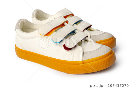 Pair of new sneakers isolated on white background 107457070