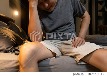 Middle aged man suffering from Benign Prostatic Hyperplasia,stress urinary incontinence,wet his pants,lack of voluntary control over urination,urinary frequency,urgency incontinence,health problems Middle aged man suffering from Benign Prostatic Hyperplasia,stress urinary incontinence,wet his pants,lack of voluntary control over urination,urinary frequency,urgency incontinence,health problems 107459517