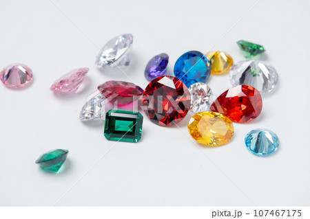 Bright gems isolated on a white background 107467175