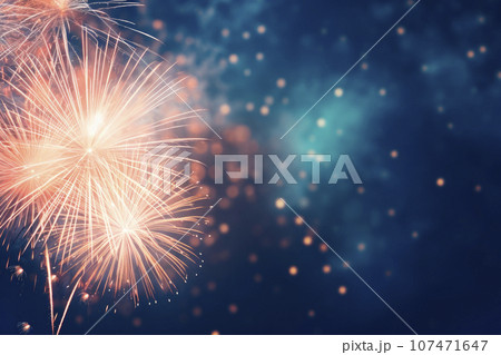 Fireworks at New Year with copy space on blue background 107471647