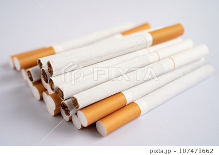 Cigarette, tobacco in roll paper with filter tube, No smoking concept. Cigarette, tobacco in roll paper with filter tube, No smoking concept. 107471662