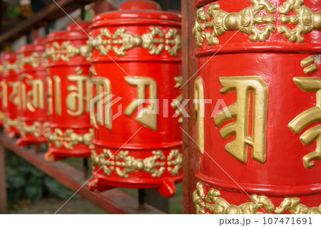 prayer wheels at the Datsan Gunzechoinei Buddhist temple prayer wheels at the Datsan Gunzechoinei Buddhist temple 107471691