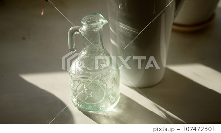 still life, watering can and bottle still life, watering can and bottle 107472301