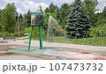 Water splash pad in a park. 107473732