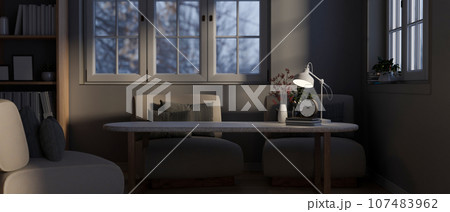 Copy space on a tabletop in a modern and comfortable living room in the evening. 107483962