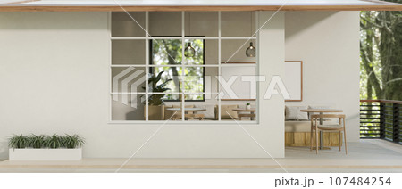 A beautiful modern minimalist coffee shop design with a balcony with a beautiful nature view. 107484254