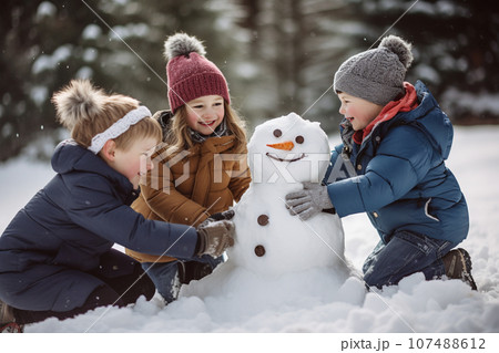 Children building a snowman together on winter day. Kids smiling and having fun while playing in snow outdoors. Generative AI. 107488612