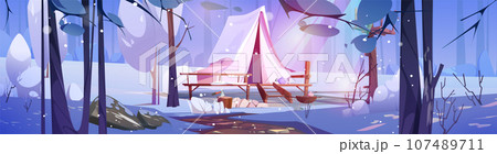 Winter camping in tent on wooden patio in forest. 107489711