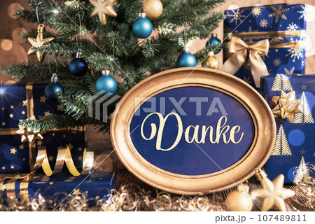 Oval Frame With Text Danke, Means Thanks, Christmas Tree Background 107489811