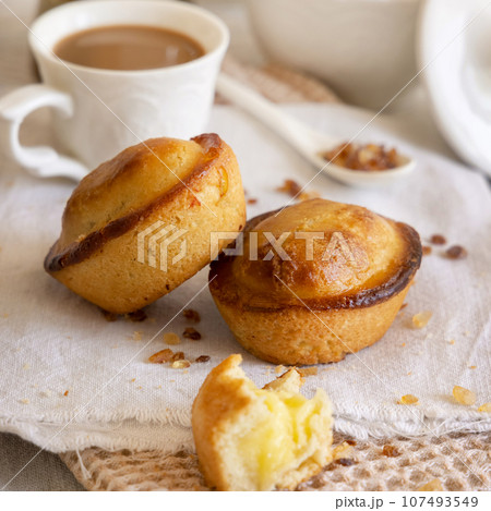 Pasticciotto leccese pastry filled with egg custard cream on a napkin close up 107493549
