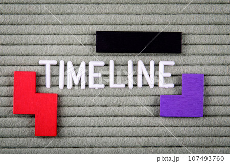 TIMELINE Concept. White letters of the alphabet on a green background TIMELINE Concept. White letters of the alphabet on a green background 107493760