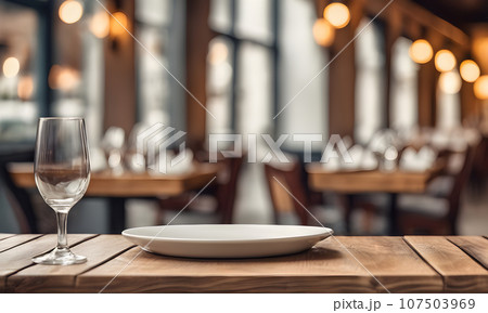 Empty plate in restaurant, versatile product mockup 107503969