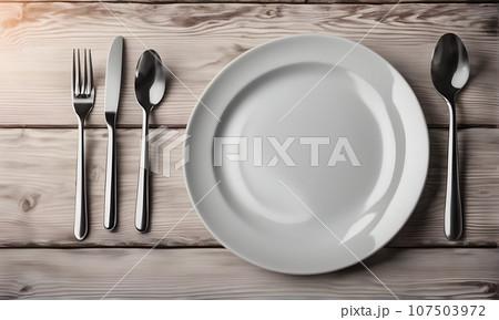 Empty plate in restaurant, versatile product mockup 107503972