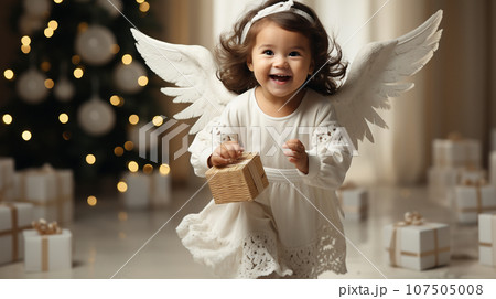 クリスマスプレゼントをもらって大喜びの少女