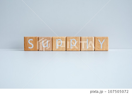 Wooden blocks form the text "Supply" against a white background. 107505072