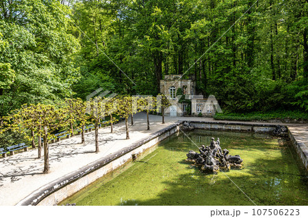 Fountain in the Low Grotto pond in the park of Historical Hermitage at Bayreuth, Bavaria, Germany Fountain in the Low Grotto pond in the park of Historical Hermitage at Bayreuth, Bavaria, Germany 107506223