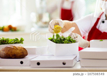 Food takeaway packaging. Restaurant packing order. Food takeaway packaging. Restaurant packing order. 107506549