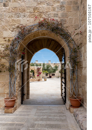 Malta, Birgu, gate leading to a courtyard with buildings inside at Fort St Angelo. 107508167