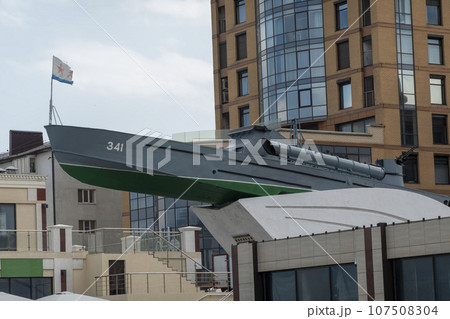 Russia, Novorossiysk. Monument torpedo boat inscription to the heroes of the sailors of the Black Sea coast on the embankment in the city near the port August 18, 2023 107508304