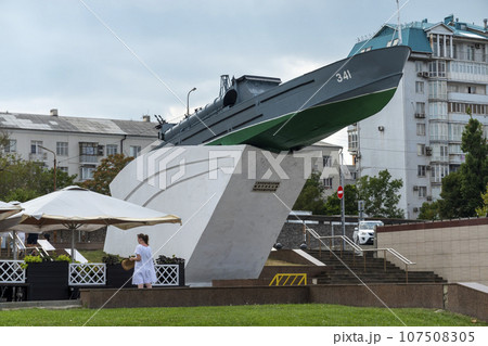 Russia, Novorossiysk. Monument torpedo boat inscription to the heroes of the sailors of the Black Sea coast on the embankment in the city near the port August 18, 2023 Russia, Novorossiysk. Monument torpedo boat inscription to the heroes of the sailors of the Black Sea coast on the embankment in the city near the port August 18, 2023 107508305
