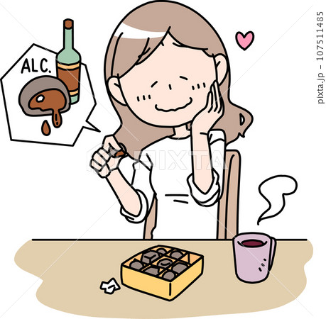 ウィスキーボンボンを食べる女性 107511485