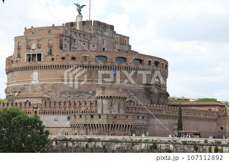 Castel Sant\'Angelo and old bridge, Rome, Italy. View of medieval Castle Sant\'Angelo, sky and Tiber River in summer. Scenery of famous Roman monument, landmark of Roma city. 107512892