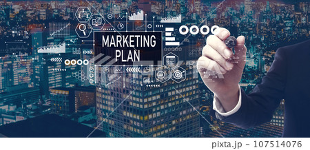 Marketing plan theme with businessman in city at night Marketing plan theme with businessman in city at night 107514076