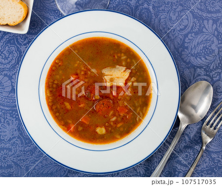 Potaje de lentejas, thick hearty lentil stew Potaje de lentejas, thick hearty lentil stew 107517035