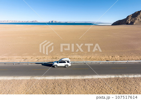 Driving car on the high altitude trail Driving car on the high altitude trail 107517614
