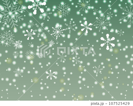 雪の結晶が舞う緑色の冬の背景 107525429