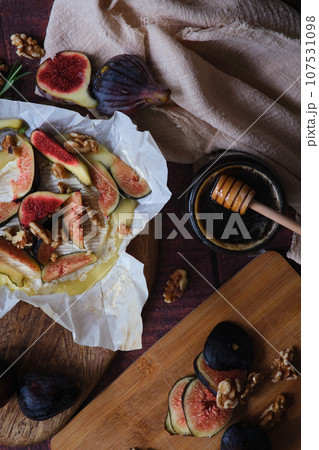 figs camembert cheese and honey figs camembert cheese and honey 107531098