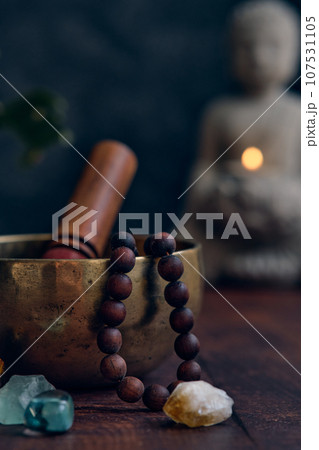 tibetan bowl with rosary beads 107531105
