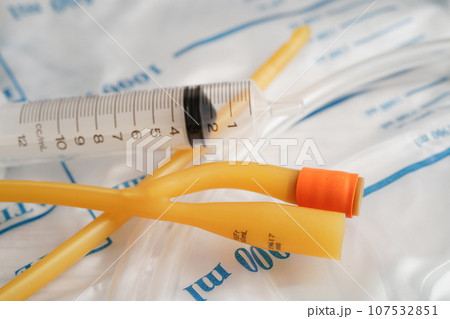 Foley catheter and urine drainage bag collect urine for disability or patient in hospital. 107532851
