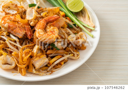 Pad Thai Seafood - Stir fried noodles with shrimps, squid or octopus and tofu Pad Thai Seafood - Stir fried noodles with shrimps, squid or octopus and tofu 107546262