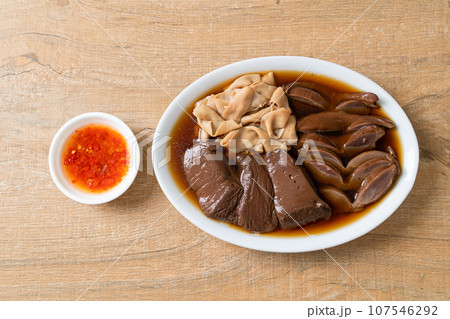 stewed duck offal in brown soup stewed duck offal in brown soup 107546292