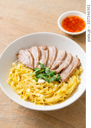 dried duck noodles in white bowl dried duck noodles in white bowl 107546301