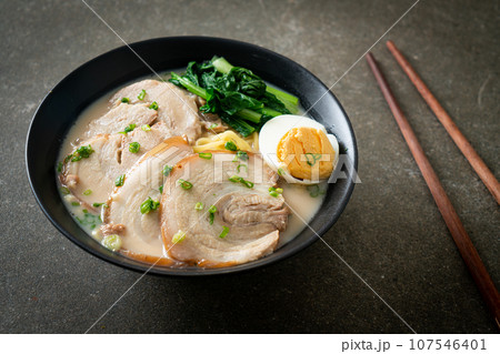 Ramen noodles in pork bone soup with roast pork and egg 107546401