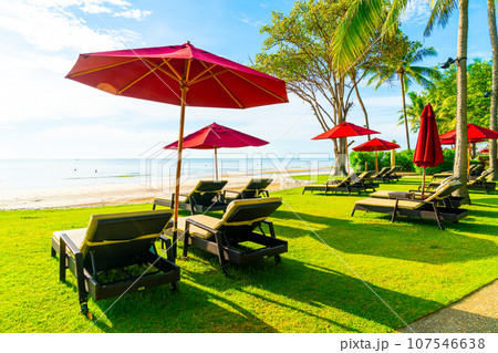 umbrella and beach chair with sea beach background and blue sky 107546638
