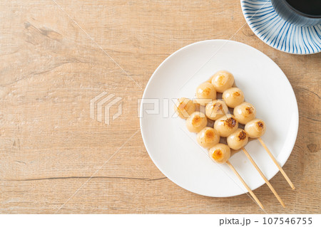 Mitarashi dango. Dumpling in a sweet soy sauce Mitarashi dango. Dumpling in a sweet soy sauce 107546755