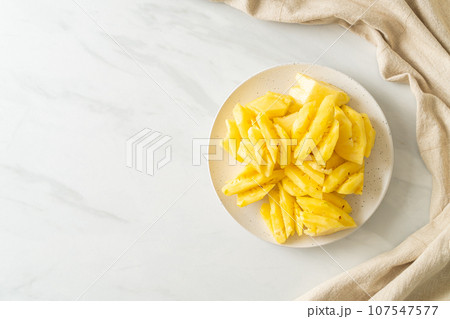 fresh pineapple sliced on plate fresh pineapple sliced on plate 107547577