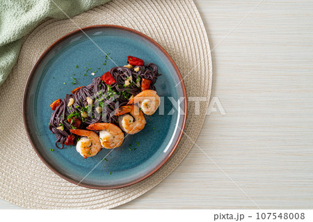 stir-fried black spaghetti with garlic and shrimps stir-fried black spaghetti with garlic and shrimps 107548008