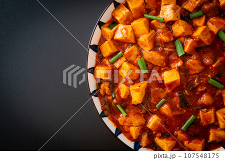 Mapo Tofu - The traditional Sichuan dish of silken tofu and ground beef, packed with mala flavor from chili oil and Sichuan peppercorns. Mapo Tofu - The traditional Sichuan dish of silken tofu and ground beef, packed with mala flavor from chili oil and Sichuan peppercorns. 107548175