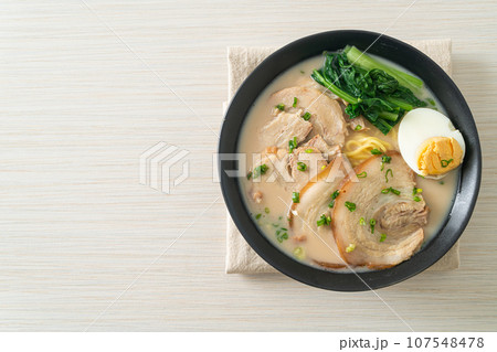 Ramen noodles in pork bone soup with roast pork and egg 107548478