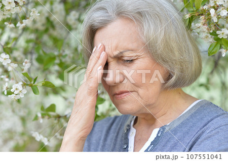 Close up portrait of unhappy senior woman Close up portrait of unhappy senior woman 107551041