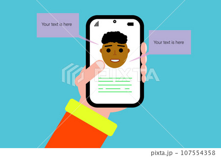 Hand holding a mobile phone with human face on screen. Space for text 107554358