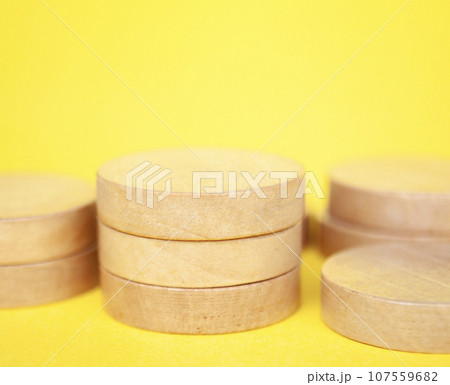 Round podium on yellow cover background. Product photography and mockup. Round podium on yellow cover background. Product photography and mockup. 107559682
